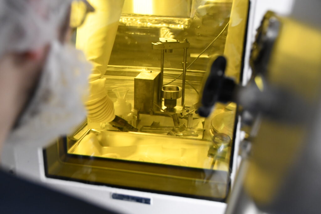 View of inside a hotcell during the TheraSphere fabrication process in Kanata, Ontario.